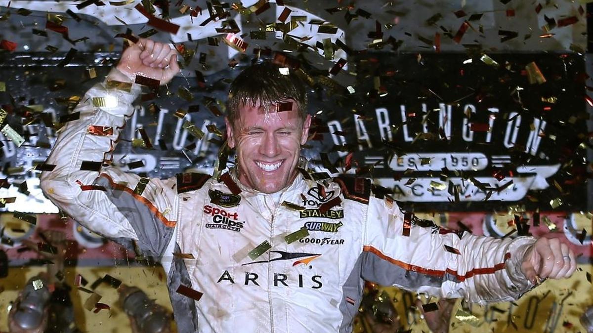 
Carl Edwards celebrates in Victory Lane after winning Sunday’s NASCAR Sprint Cup Series Bojangles' Southern 500 at Darlington Raceway in Darlington, S.C.


