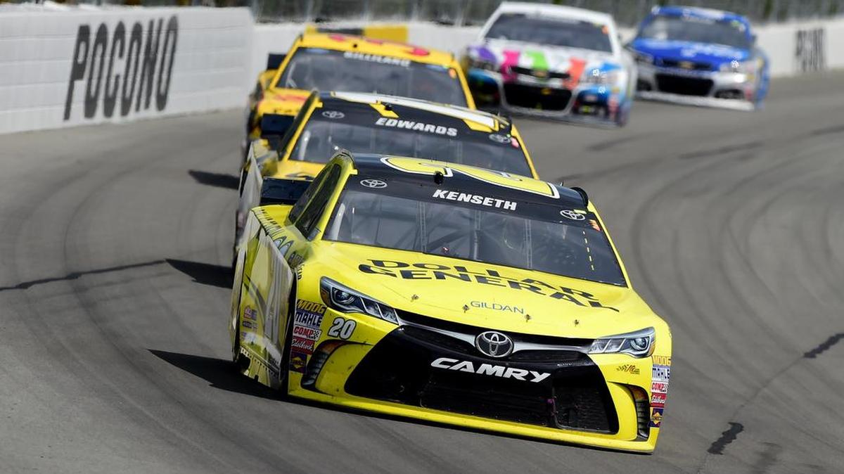 
Matt Kenseth leads a pack of cars during the NASCAR Sprint Cup Series Windows 10 400 at Pocono Raceway on Sunday, Aug. 2, 2015 in Long Pond, Pa.
