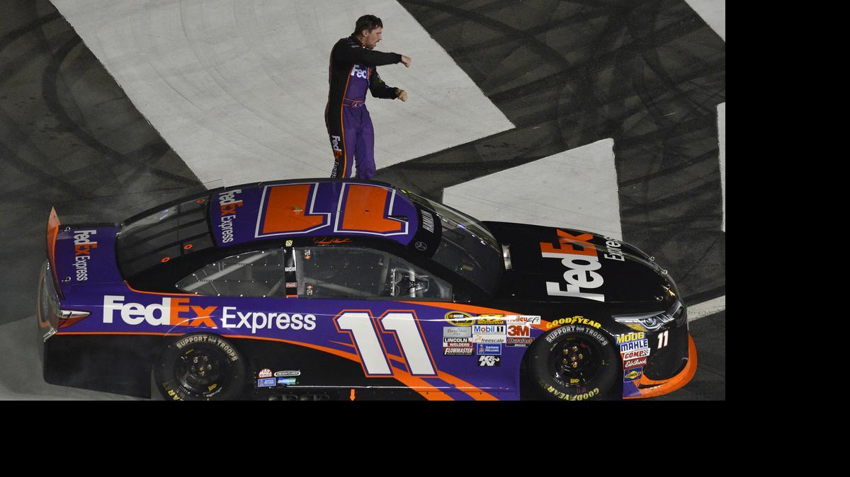 
Denny Hamlin celebrates his win in the NASCAR Sprint All-Star Race at Charlotte Motor Speedway, Saturday, May 16, 2015.
