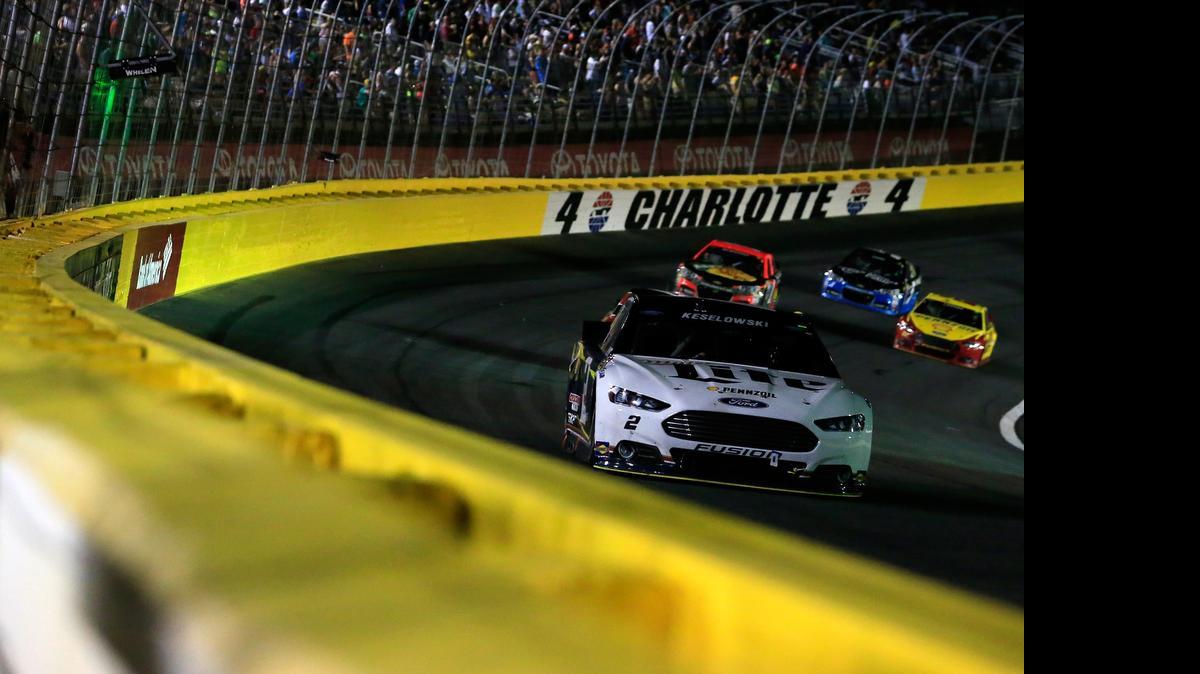 
Brad Keselowski leads a pack of cars during Saturday’s NASCAR Sprint All-Star Race at Charlotte Motor Speedway.


