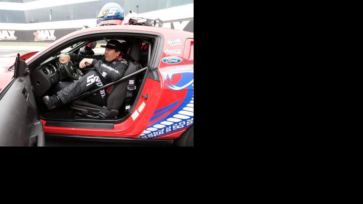 
Joey Logano and Cruz Pedregon, above, were at zMax Dragway and Charlotte Motor Speedway in Concord on Wednesday, March 25, 2015.


