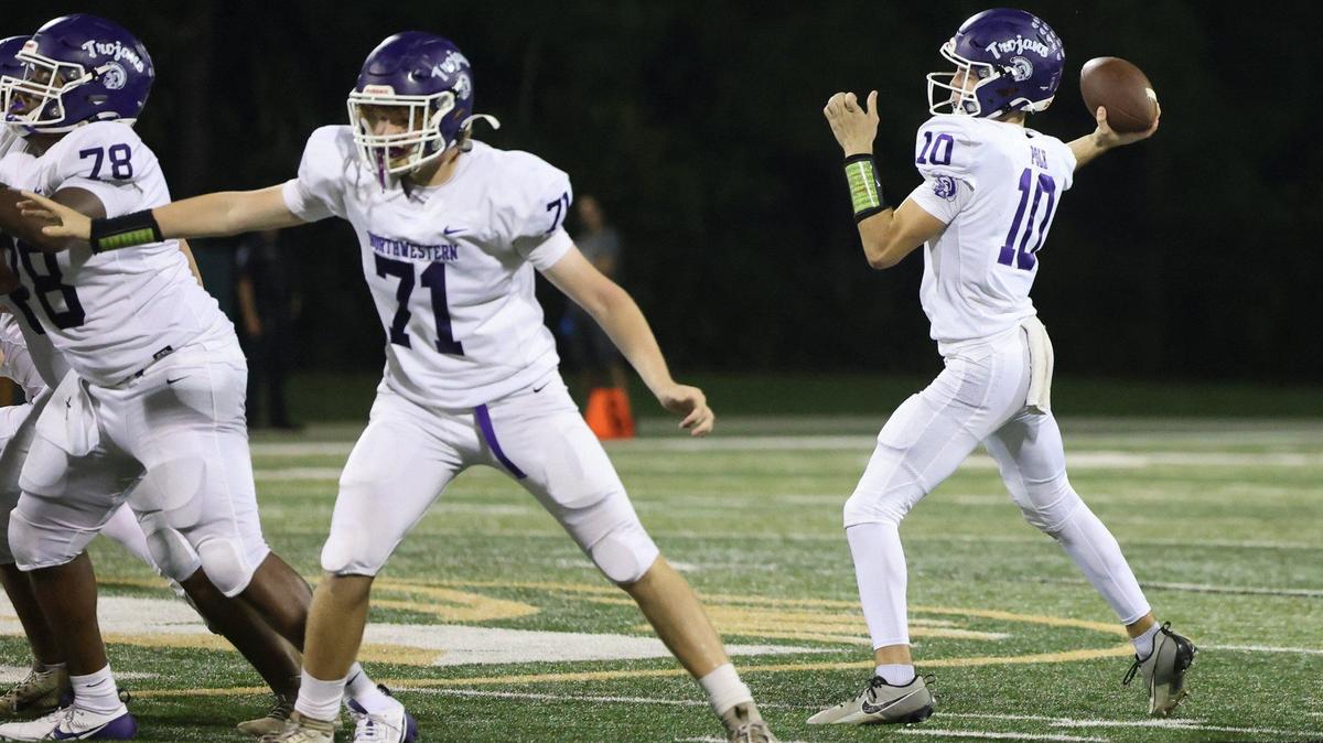 Northwestern quarterback Finley Polk looks for an opening Friday, Sept. 27, 2024 as the Trojans take on the Catawba Ridge Copperheads in Fort Mill, S.C.