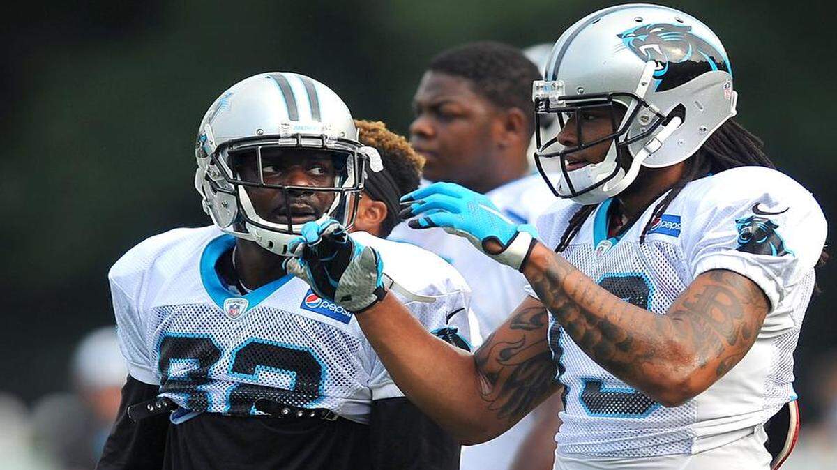
Carolina Panthers veteran wide receiver Jerricho Cotchery, left, says a big part of his role is mentoring the team’s young receivers, such as Kelvin Benjamin, right.
