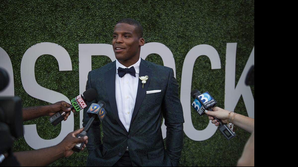 
Cam Newton speaks to the media during a press conference at the 2015 Kids Rock! Gala put on by the Cam Newton Foundation on Saturday, June 13, 2015.
