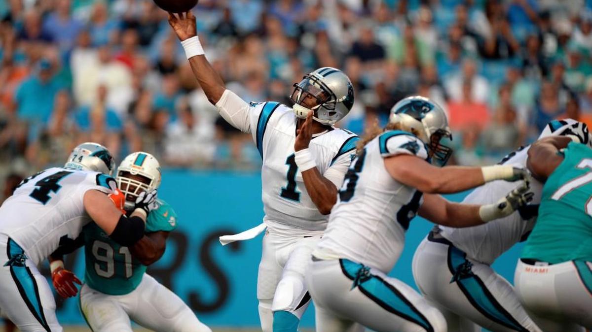 
Carolina Panthers quarterback Cam Newton, who walked with a slight limp along the sideline in the second half, went 4-for-10 for 42 yards and an interception that was nearly a touchdown. The Panthers won, 31-20, over the Dolphins on Saturday night.


