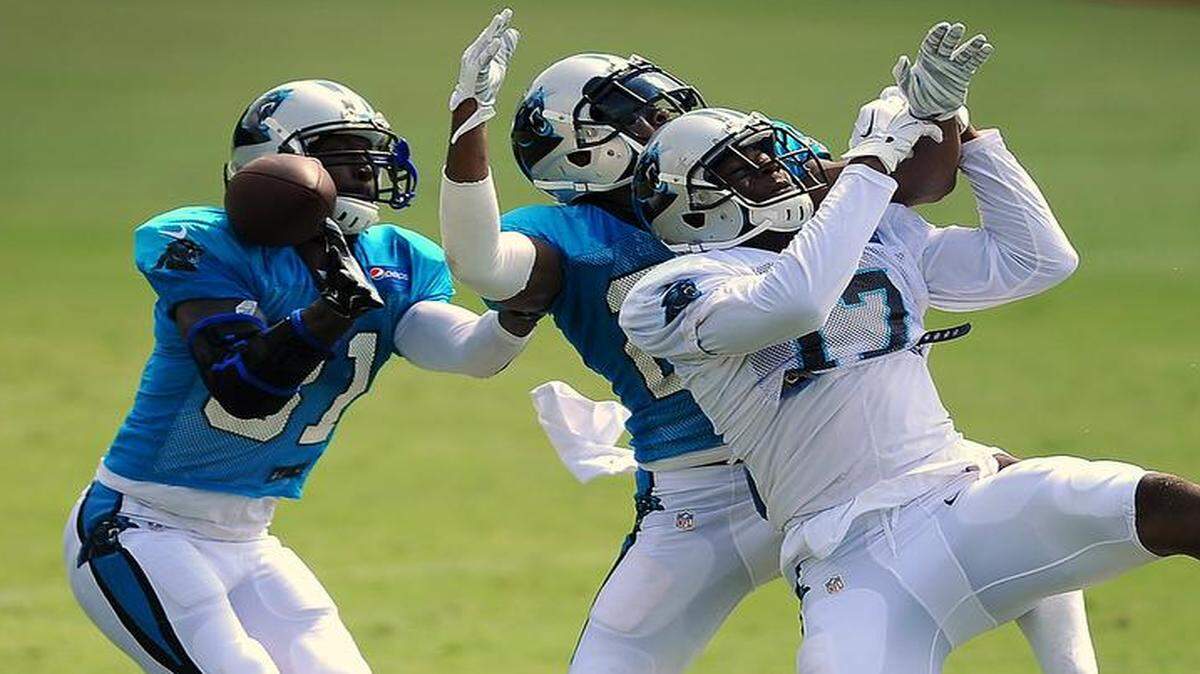 
The addition of players such as cornerback Charles Tillman, left, and the emergence of cornerback Josh Norman, center, has moved the Carolina Panthers’ secondary from no-name to in need of a nickname.
