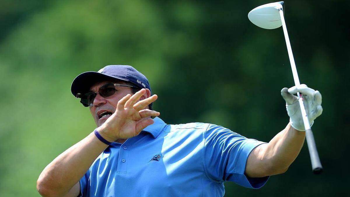 
Carolina Panthers head coach Ron Rivera watches his drive from the second tee box during the HoopTee Celebrity Golf Tournament at Ballantyne Resort on Thursday. Rivera and the Panthers report to training camp in Spartanburg, S.C., next week. 
