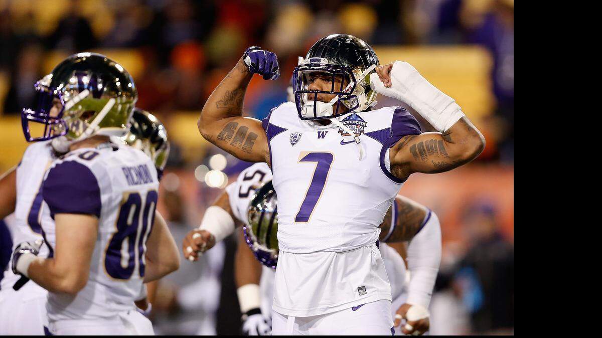 
The Carolina Panthers drafted a do-it-all defensive player when they selected former University of Washington linebacker Shaq Thompson (7) with the 25th overall pick in Thursday's NFL Draft.


