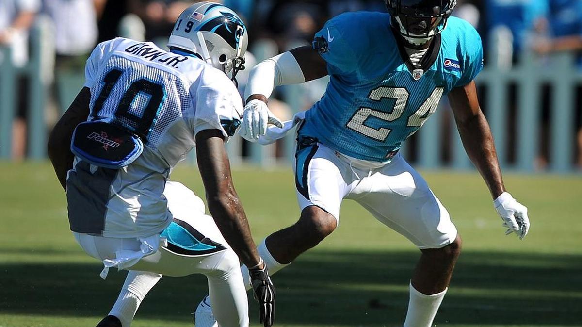 
Carolina Panthers wide receiver Ted Ginn Jr., left, stops and breaks as cornerback Josh Norman attempts to get a read on the play during practice on Sunday, Aug. 2, 2015 at Wofford College in Spartanburg, S.C.
