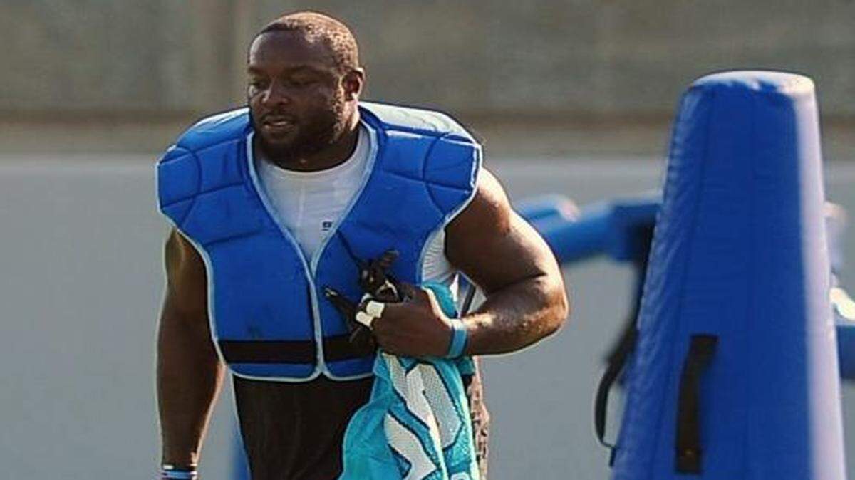 
Carolina Panthers defensive end Charles Johnson jogs across a field to join his teammates during practice on Wednesday. Johnson said he feels like he needs some snaps in the preseason to be ready for opener at Jacksonville. 
