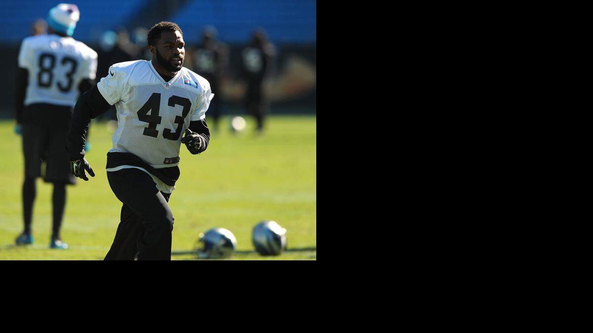 
Carolina Panthers running back Fozzy Whittaker (43) saw his role in the offense increase late in the season. Monday, he signed a new, two-year deal with the team. 
