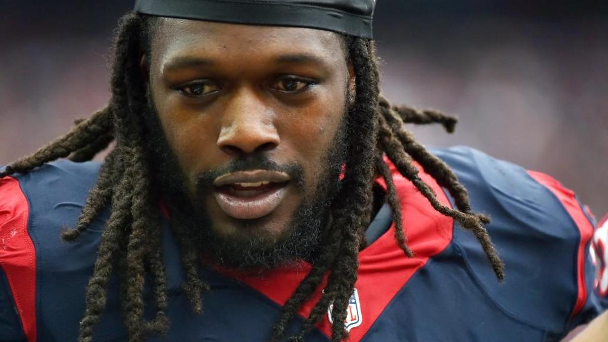 Houston Texans' Jadeveon Clowney stands on the sideline during the second half of an NFL football game against the Detroit Lions Sunday, Oct. 30, 2016, in Houston.