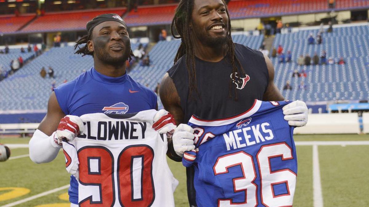 Buffalo Bills defensive back Jonathan Meeks, left, and Houston Texans outside linebacker Jadeveon Clowney pose for a photograph after exchanging jerseys after an NFL football game, Sunday, Dec. 6, 2015, in Orchard Park, N.Y. The Bills won 30-21. Meeks played at Rock Hill High and Clemson, while Clowney played at South Pointe and South Carolina.