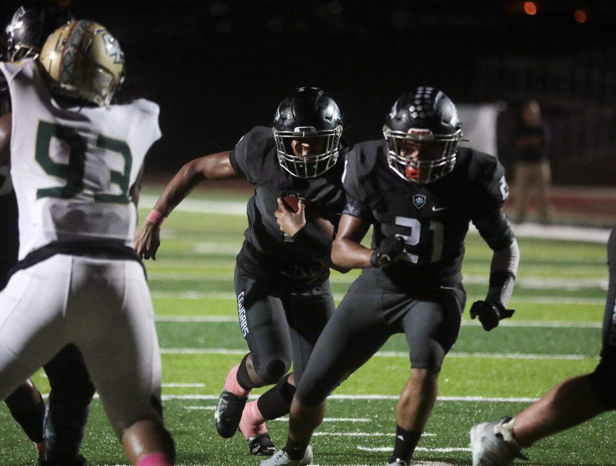 York’s Aiden Davis heads to the endzone Friday as the Cougars take on the Catawba Ridge Copperheads in York.
