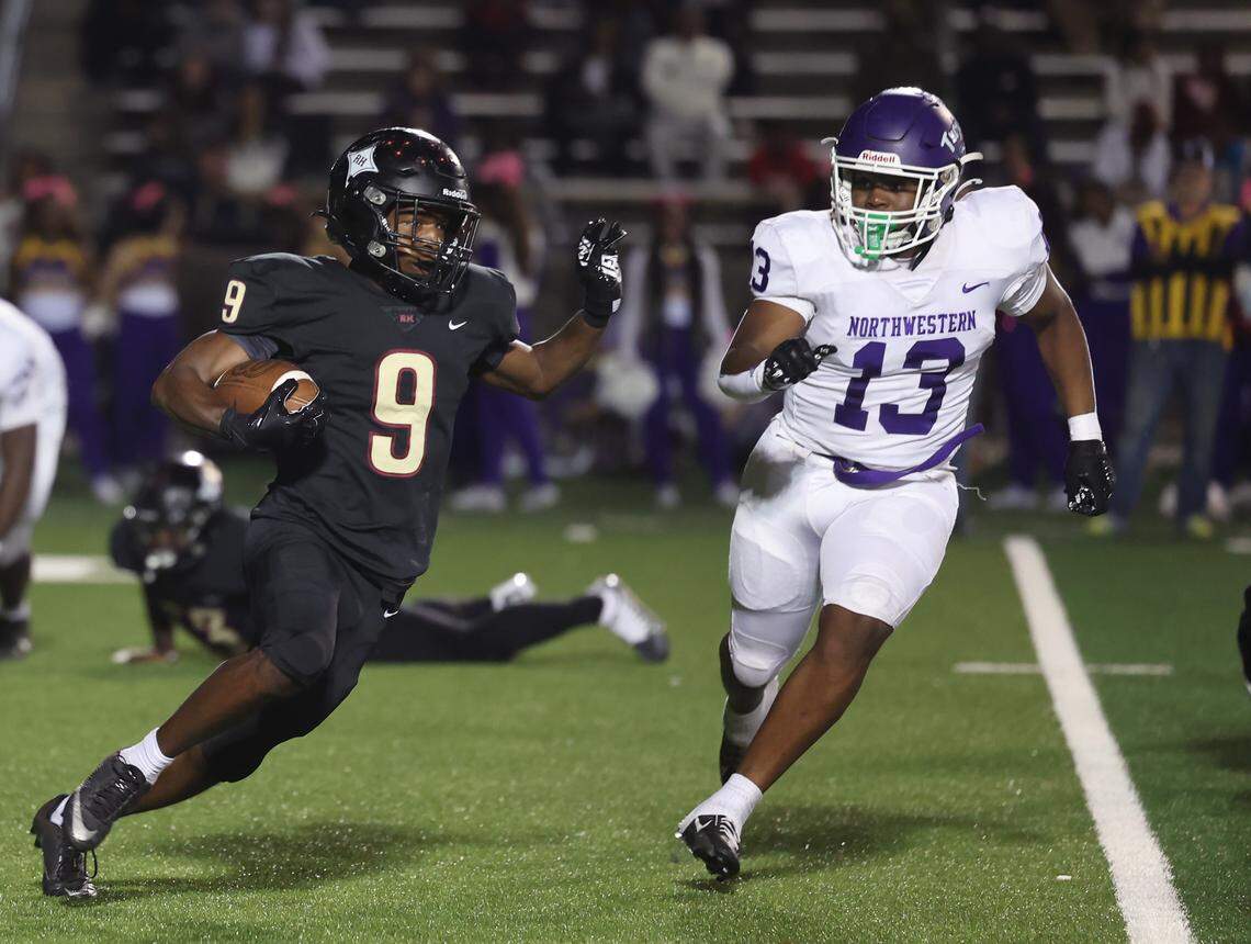 Rock Hill's Devan Erby carries the ball against Northwestern's Jeremiah Cannon Friday, Oct. 17, 2025 in Rock Hill, S.C.