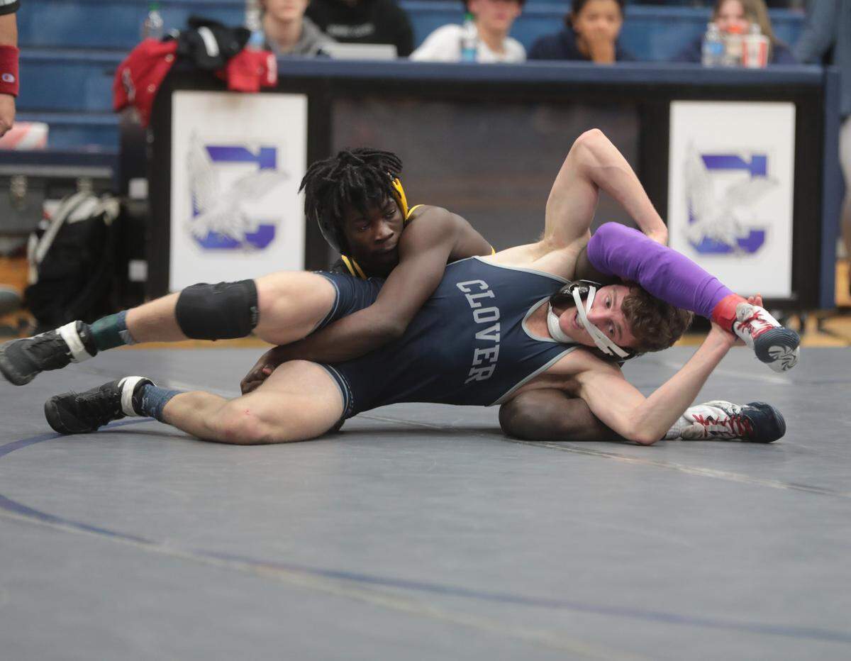 Clover’s Michael Tomko and Michael Greene compete in the 152-pound weight class.