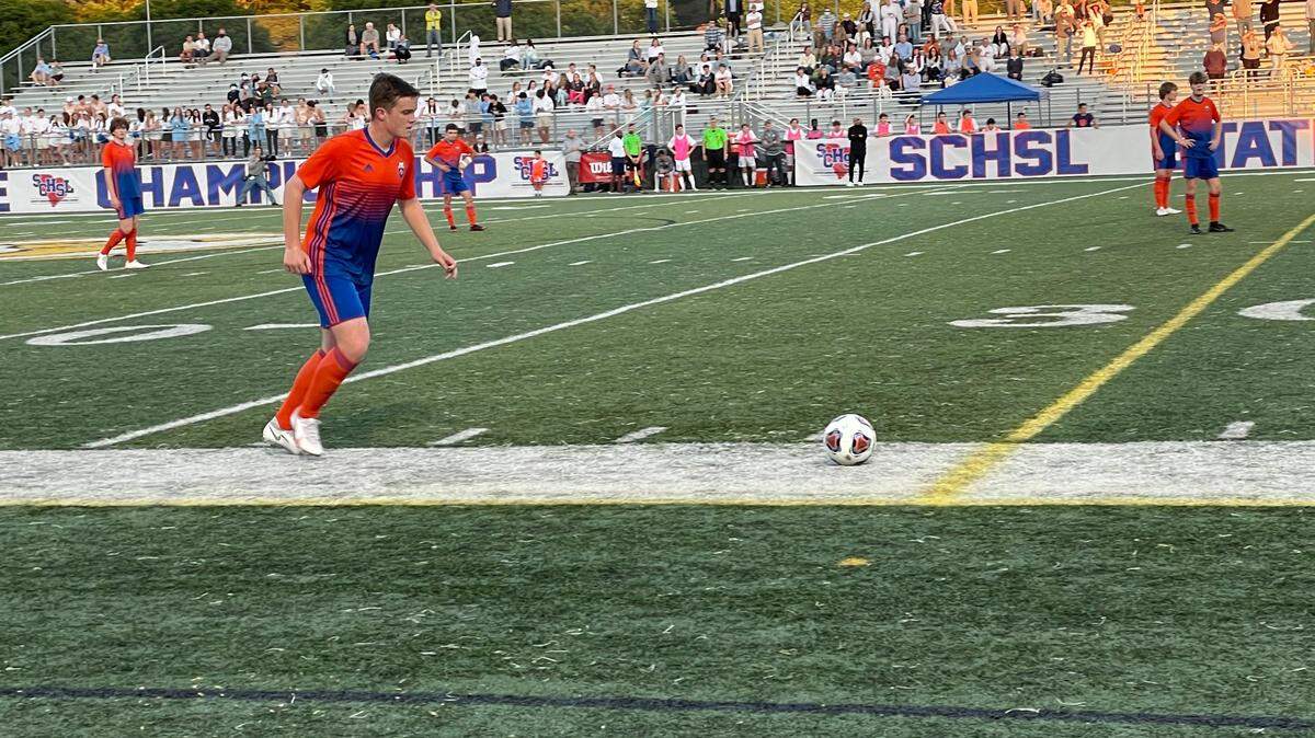 Andrew Jackson defender Owen Phillips takes an indirect kick in the first half of the 2021 2A state championship game in Irmo.