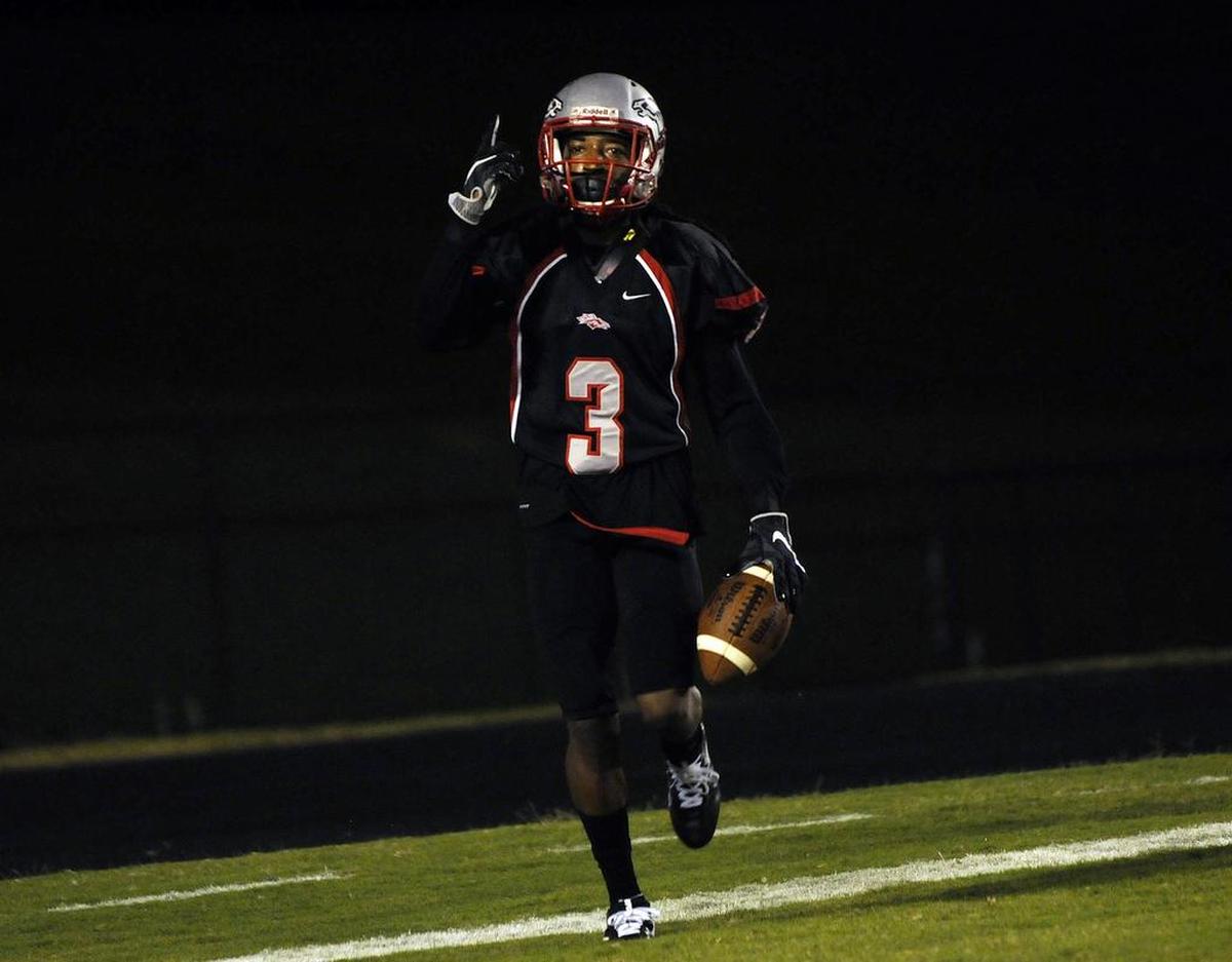 South Pointe’s Steven Gilmore runs off the field after scoring a touchdown.
