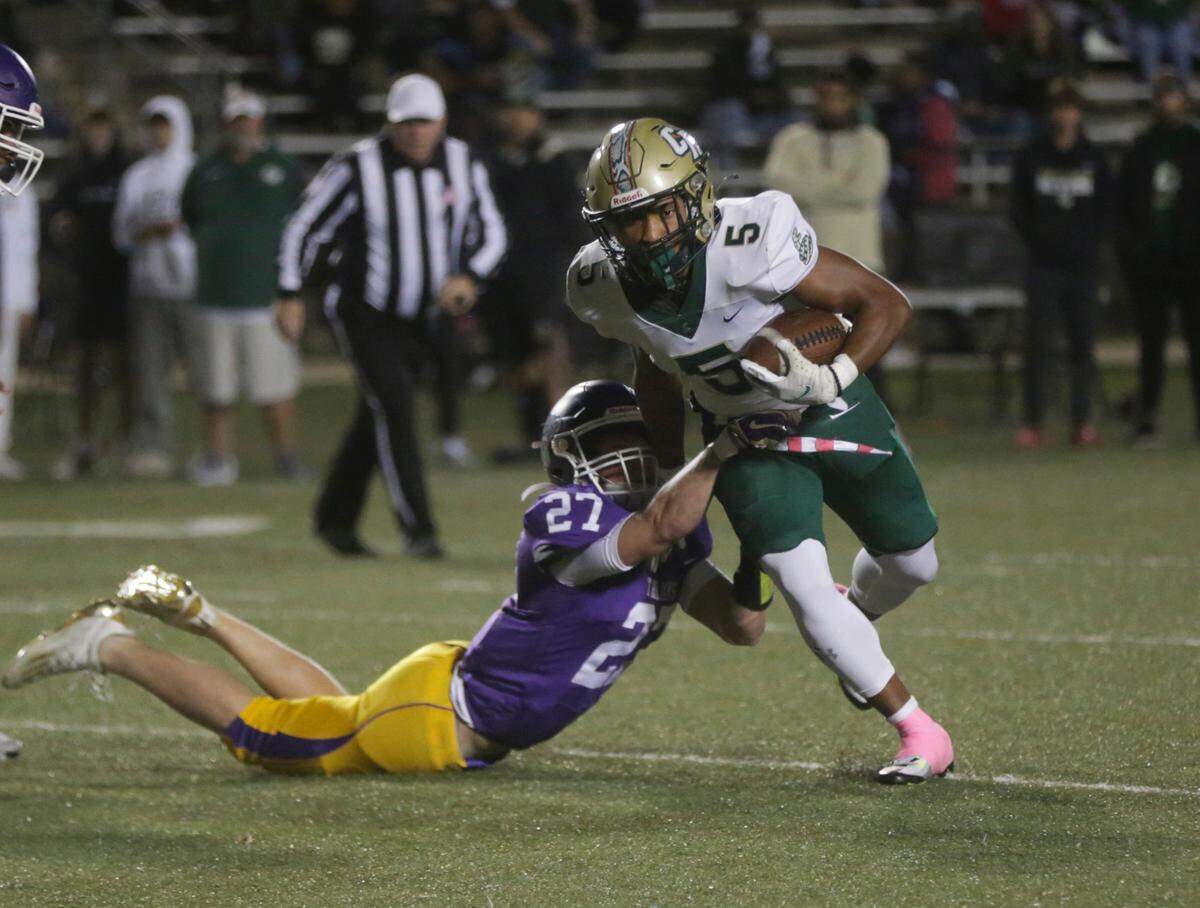 Northwestern’s Travis Robbins (27) tries to stop Catawba Ridge’s Ira Mister on Friday, Oct. 28, 2022 in Rock Hill, S.C.
