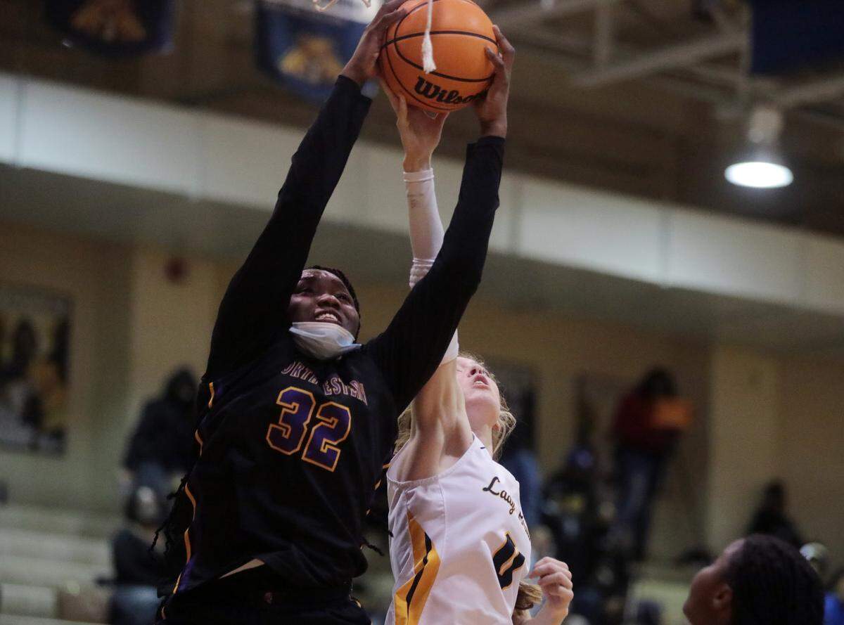 Northwestern’s Janiya Cunningham (32) shoots the basketball against Lancaster’s Addie Small.