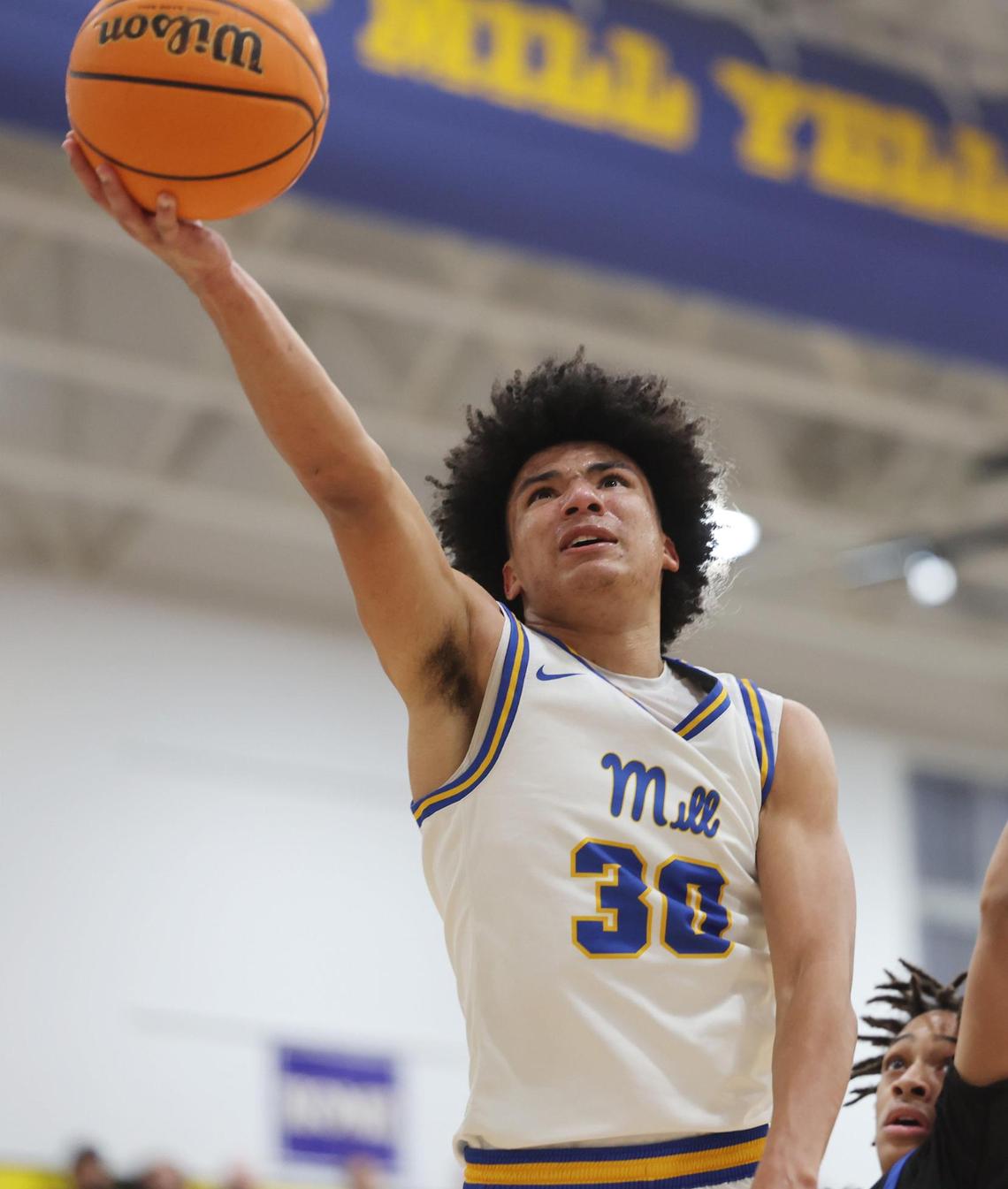 Fort Mill’s Logan Parker puts up the shot Wednesday as the Yellowjackets take on the Indian Land Warriors in Fort Mill.
