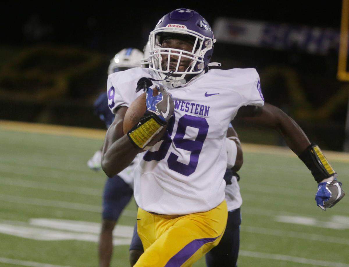 Northwestern’s Jayden Burris heads to the endzone Saturday at the Class 4A State Championship game in Columbia.