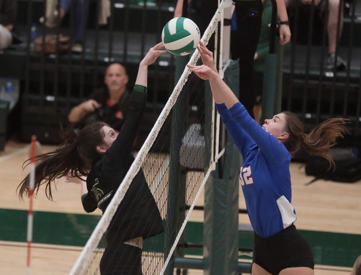 Catawba Ridge’s Marissa Fakes, left, blocks a shot from Pickens’ Faith Clarkson.