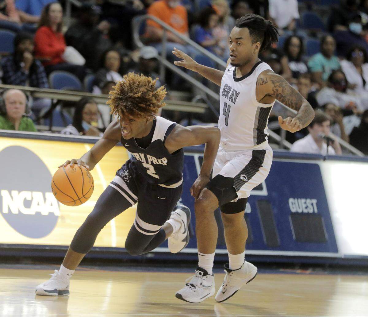 York Prep’s Kory Davis heads to the basket around Gray’s Calvin Hall.