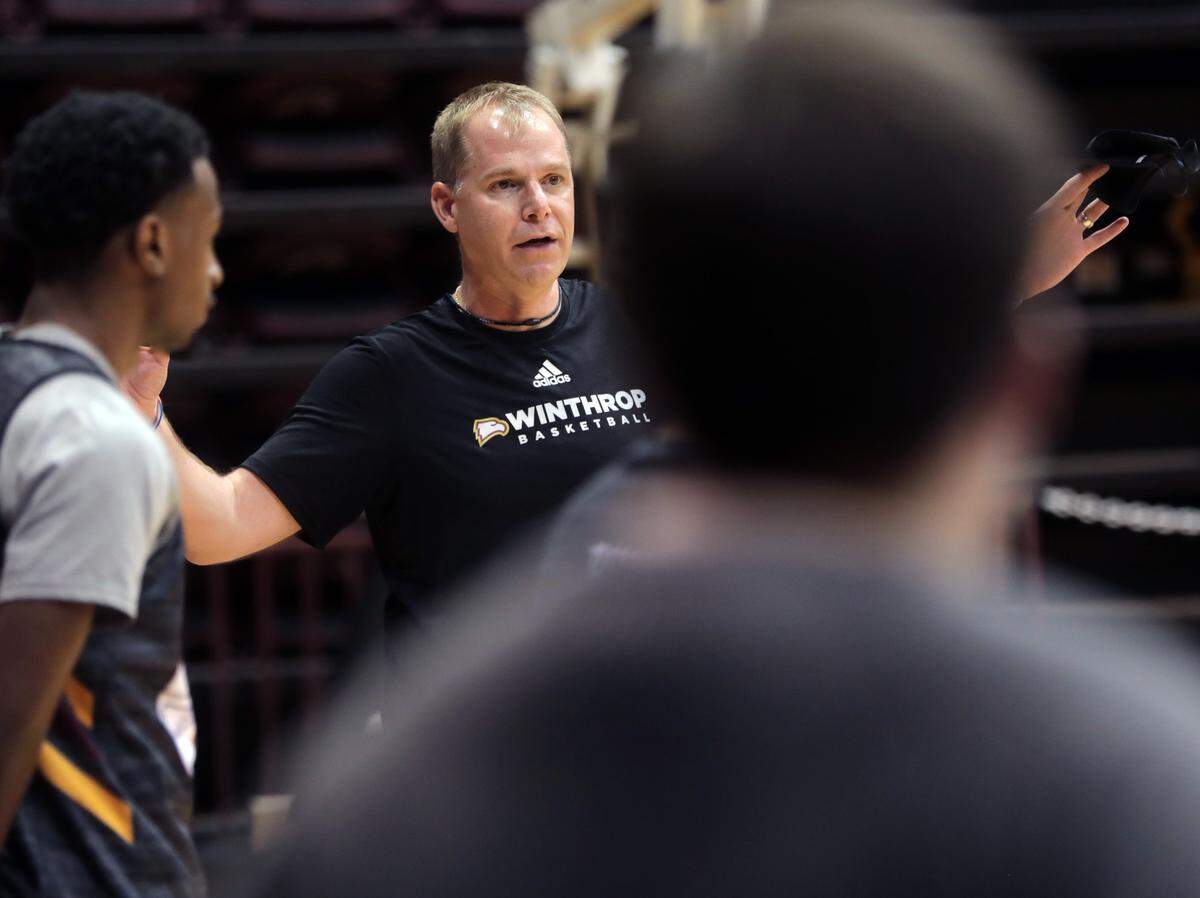 Herald file: Winthrop University men’s basketball coach Mark Prosser leads practice Thursday. His team begins the 2021 season on Tuesday against Mary Baldwin.