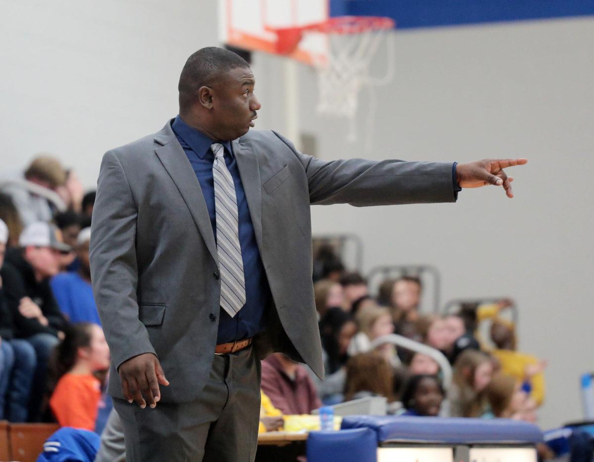 Herald file: Michael McCray led the Lewisville High School boys basketball team for eight seasons before accepting the job at Northwestern.