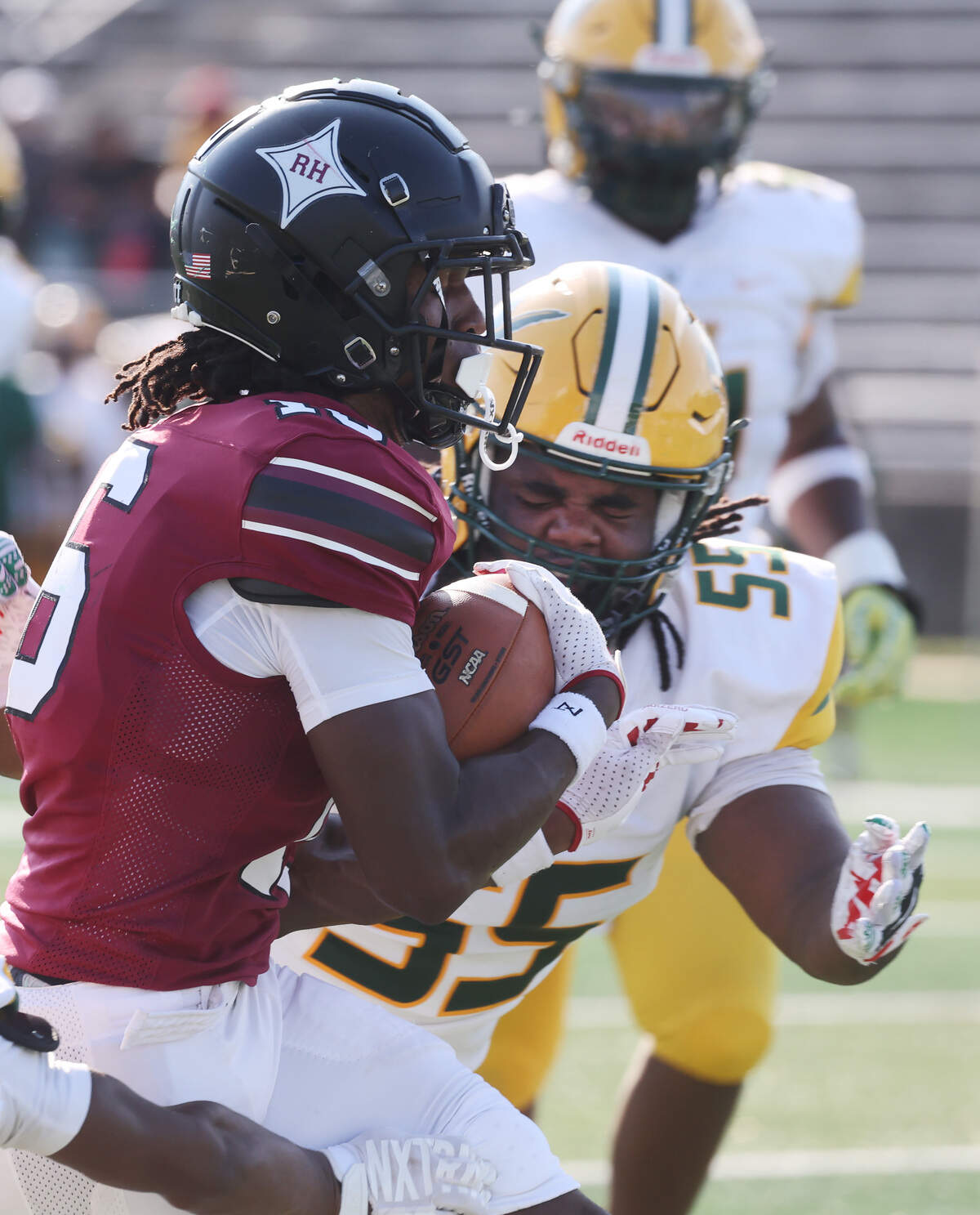 Rock Hill's Jonah Young carries the ball against Spring Valley's Cameron Scott on Friday, Aug. 15, 2025, at District Three Stadium in Rock Hill, S.C.