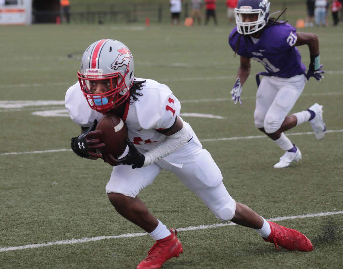 South Pointe’s Jakhari Webb catches the ball Saturday at District Three Stadium.