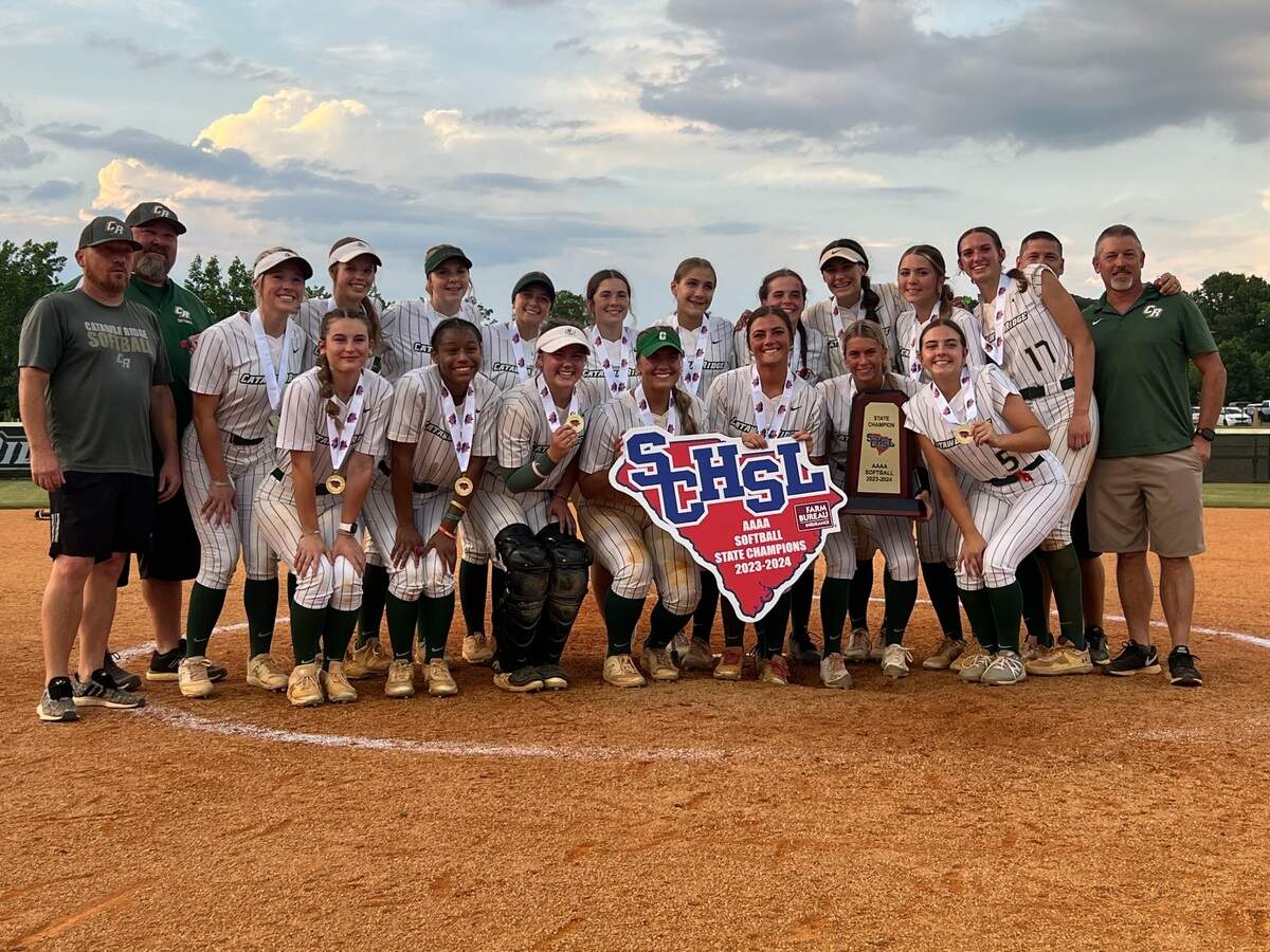 The Catawba Ridge softball team poses with the 4A state trophy following its 6-3 win over West Florence Thursday night.