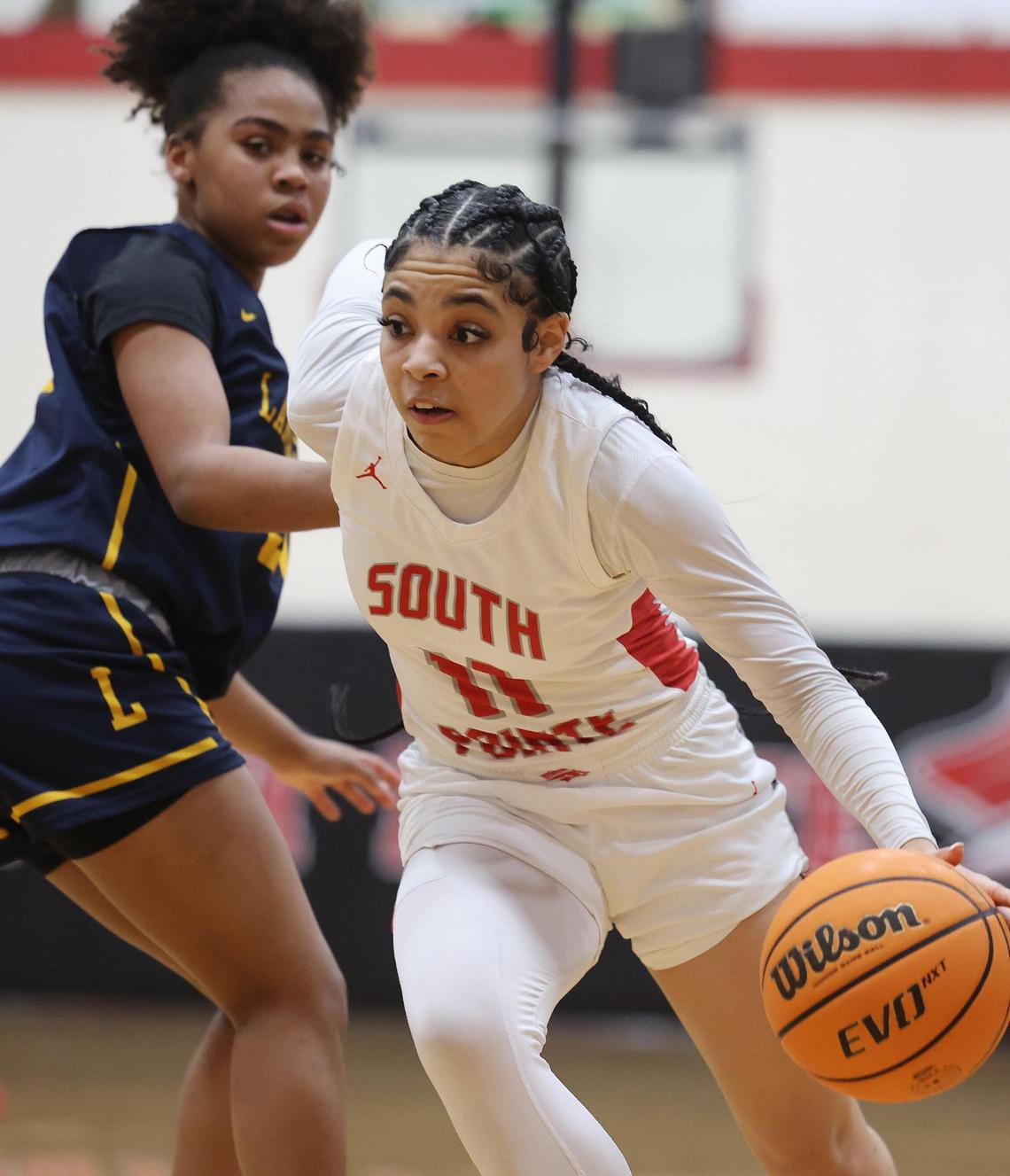 South Pointe’s Serenity Woods dribbles up the court Tuesday in Rock Hill, S.C.