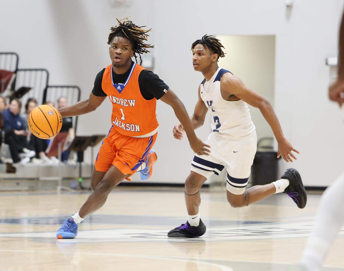 Andrew Jackson’s dribbles down the court against York Prep’s Josiah Peoples