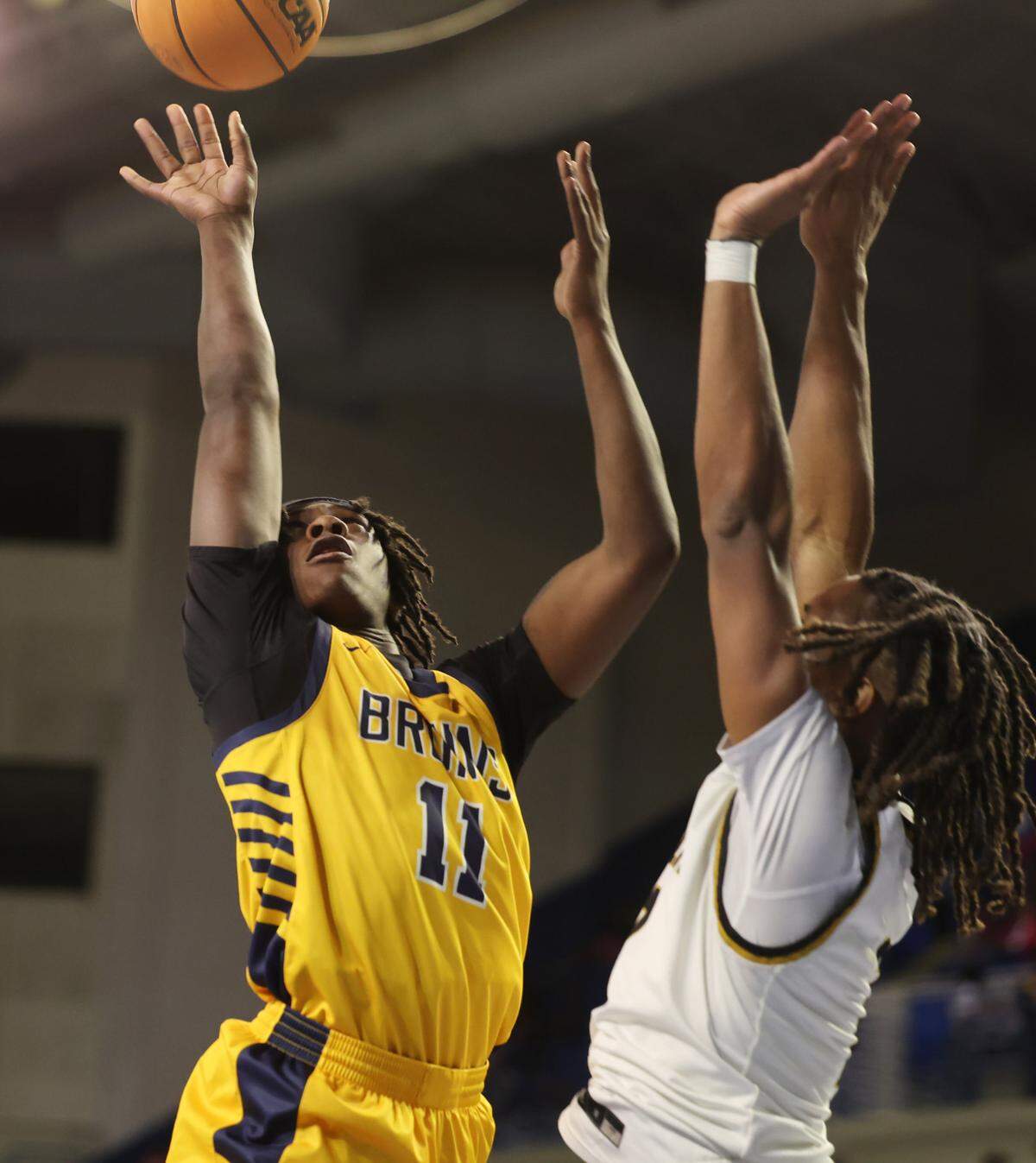 Lancaster’s Jacarey Ballard shoots the ball as North Augusta’s Toian Nabriat defends Friday at the Class 4A state championship game in Florence