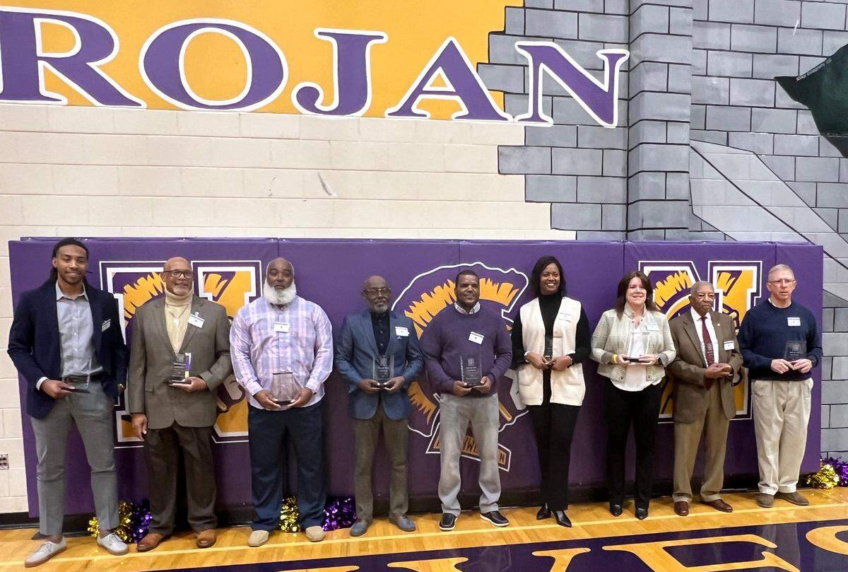 The Northwestern High School Athletics Hall of Fame Class of 2023. (From left to right: Sean Barnette, James Blake, Patrick Burris, Sammie Dixon, Myron “Dee” Feaster, Leah Moody, Windy Sharp, Samuel R. Foster, Calvin Hudgins)
