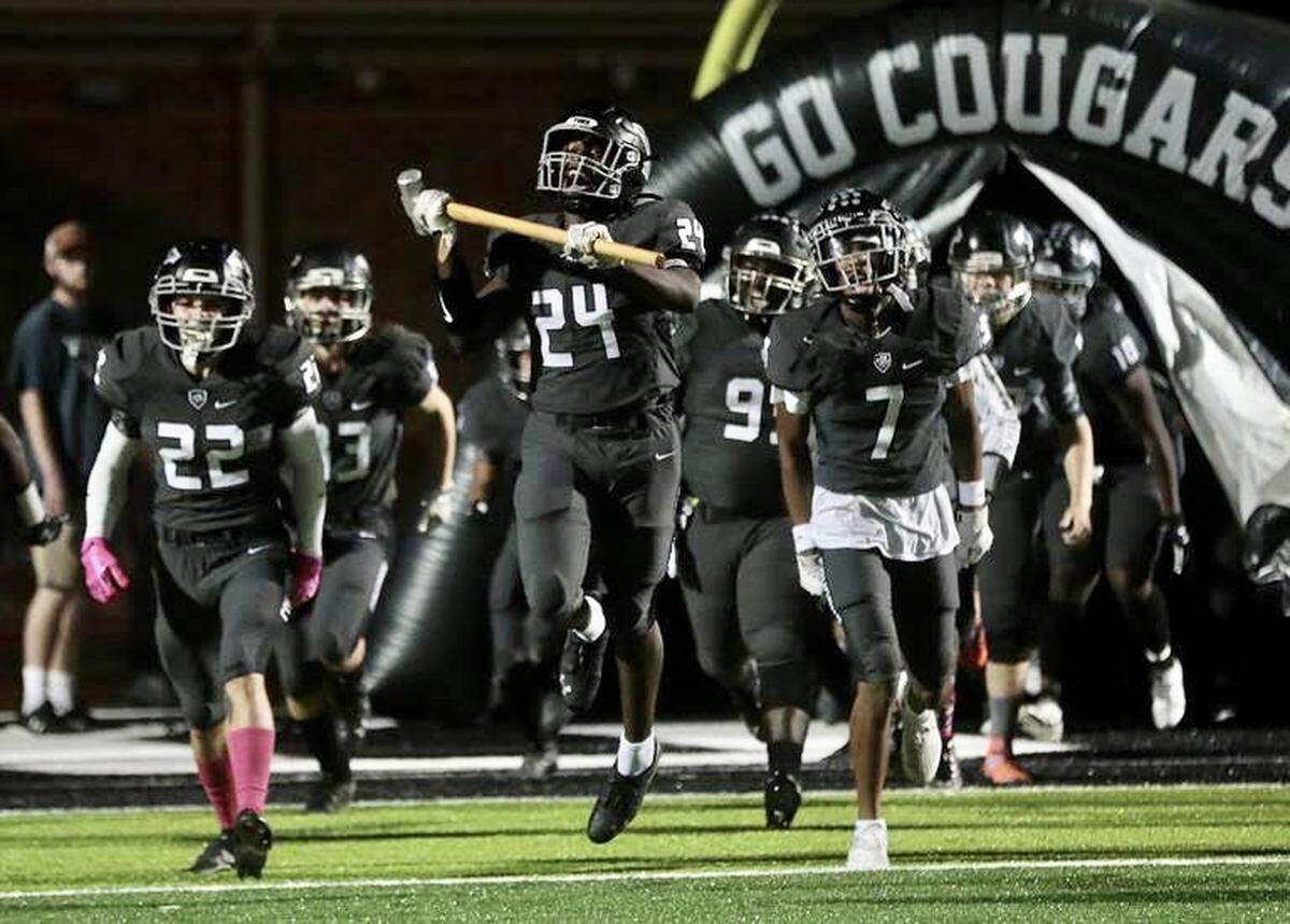 The York Comprehensive High School varsity football team runs onto the field Friday to compete with Catawba Ridge. York is hosting Fort Mill on Friday night (Oct. 15).