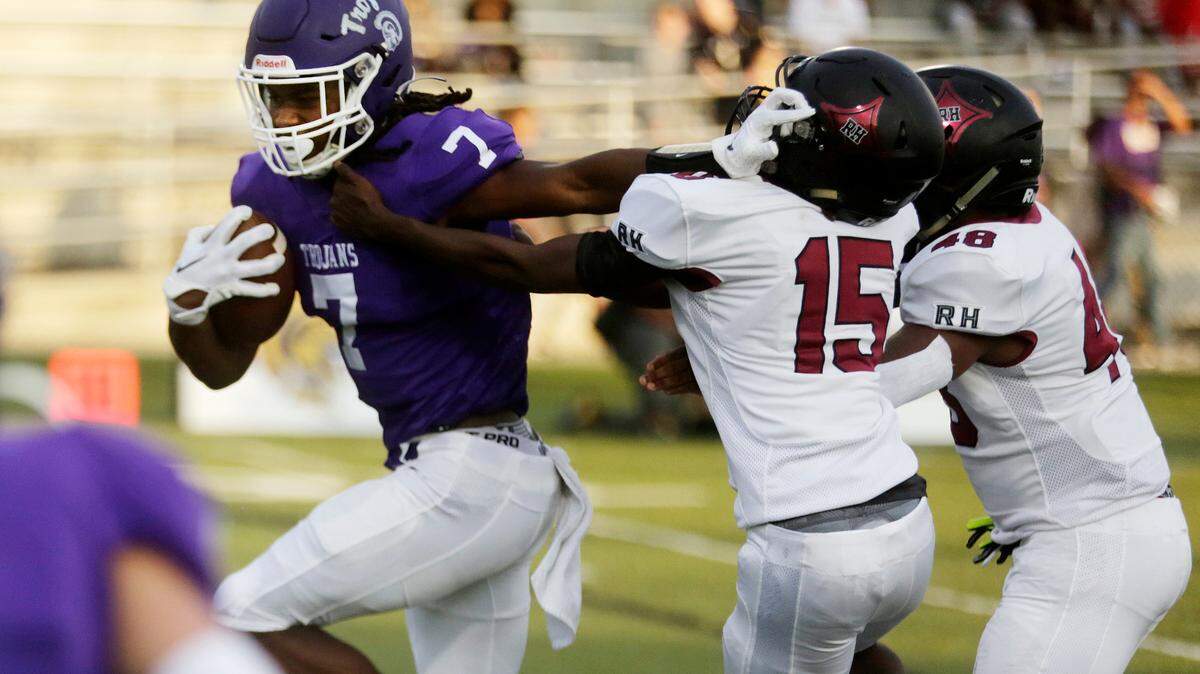 Northwestern’s Elijah Caldwell carries the ball against Rock Hill’s Zy English.