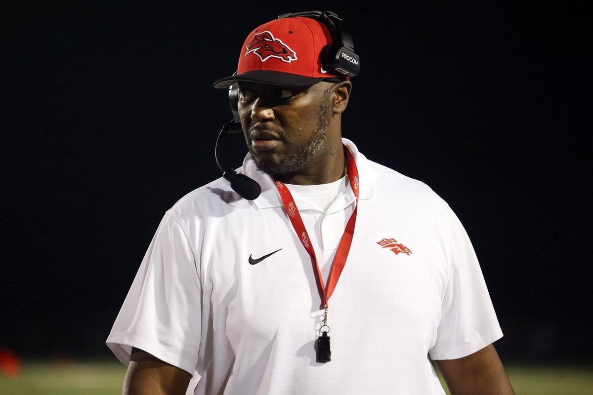South Pointe head varsity football coach watches his team play against Spartanburg Friday in Rock Hill.