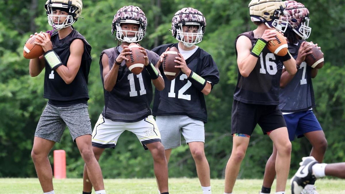 Northwestern High School football players practice after school Thursday.