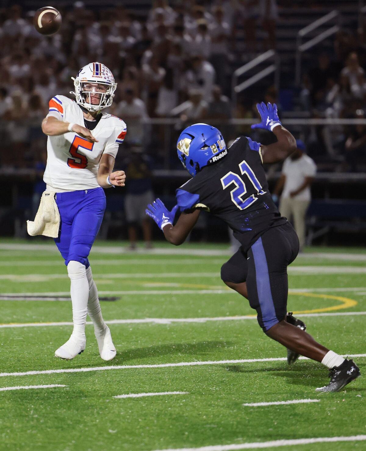 Marvin Ridge quarterback Braydon Rediger throws the ball against Indian Land’s Leonard Goethe Jr.