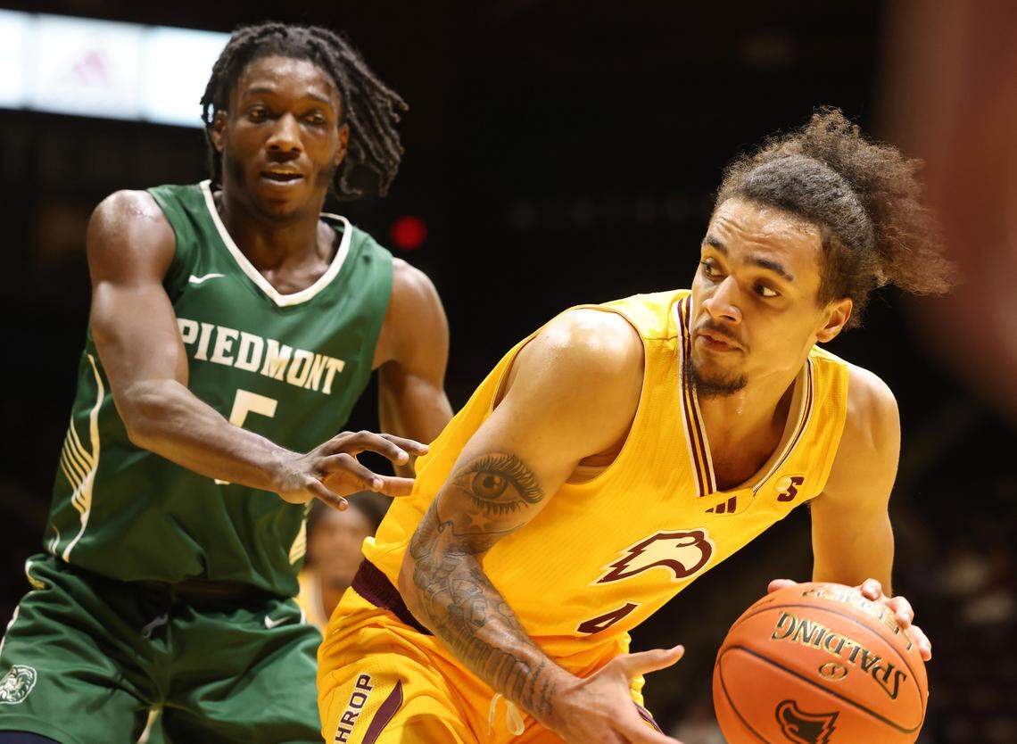 Winthrop’s Kelton Talford looks over his shoulder as Piedmont’s Javi Marlowe waits for his move Monday, Nov. 4, 2024 in Rock Hill, S.C.