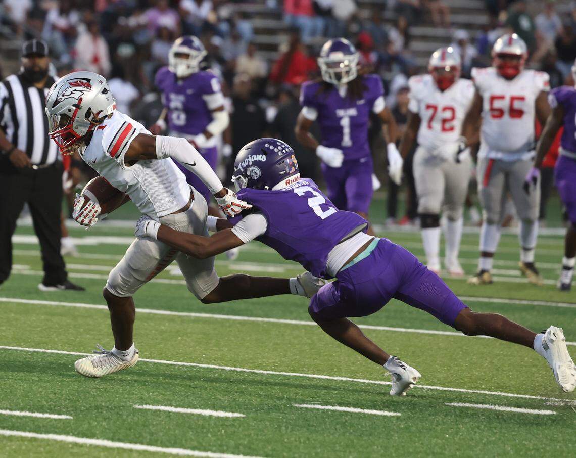 Northwestern's Josh Singleton tackles South Pointe's Malik Ratliff as the Trojans and Stallions meet Friday, Sept. 12, 2025 in Rock Hill, S.C.