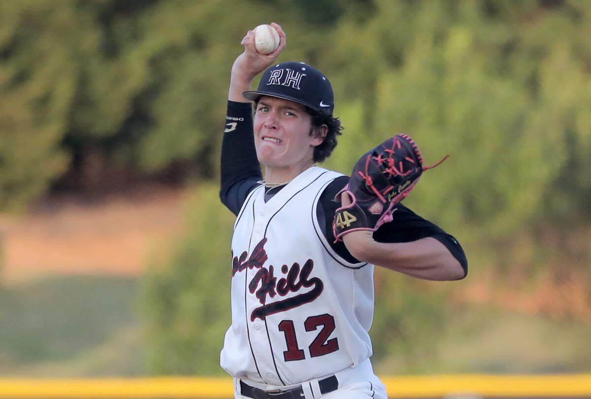 Rock Hill’s Cole Canty pitches during the Bearcats’ meetup with the Northwestern Trojans Friday.
