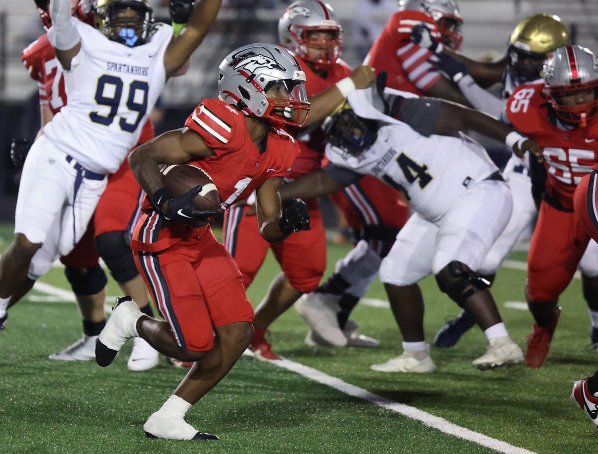 South Pointe’s Mason Hicks carries the ball Friday as the Stallions take on Spartanburg.
